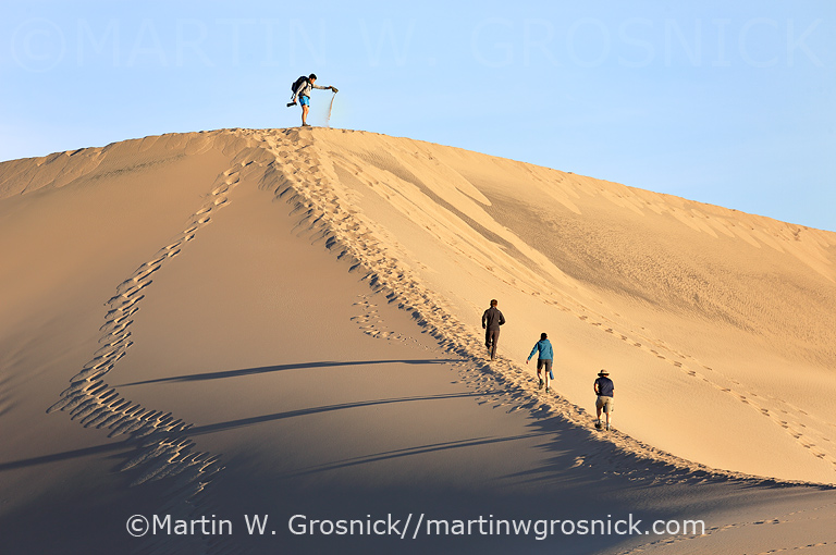 People On Sand Dune